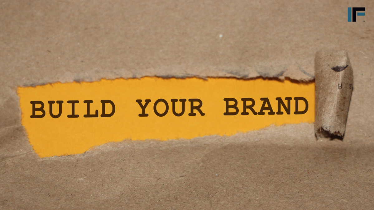 words revealed through torn paper - build your brand